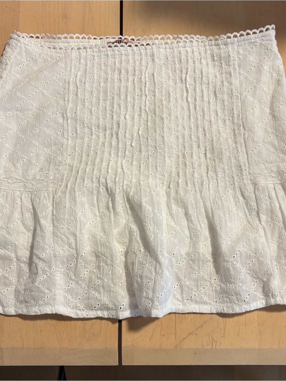 White Eyelet Mini Skirt with Pintuck Detailing